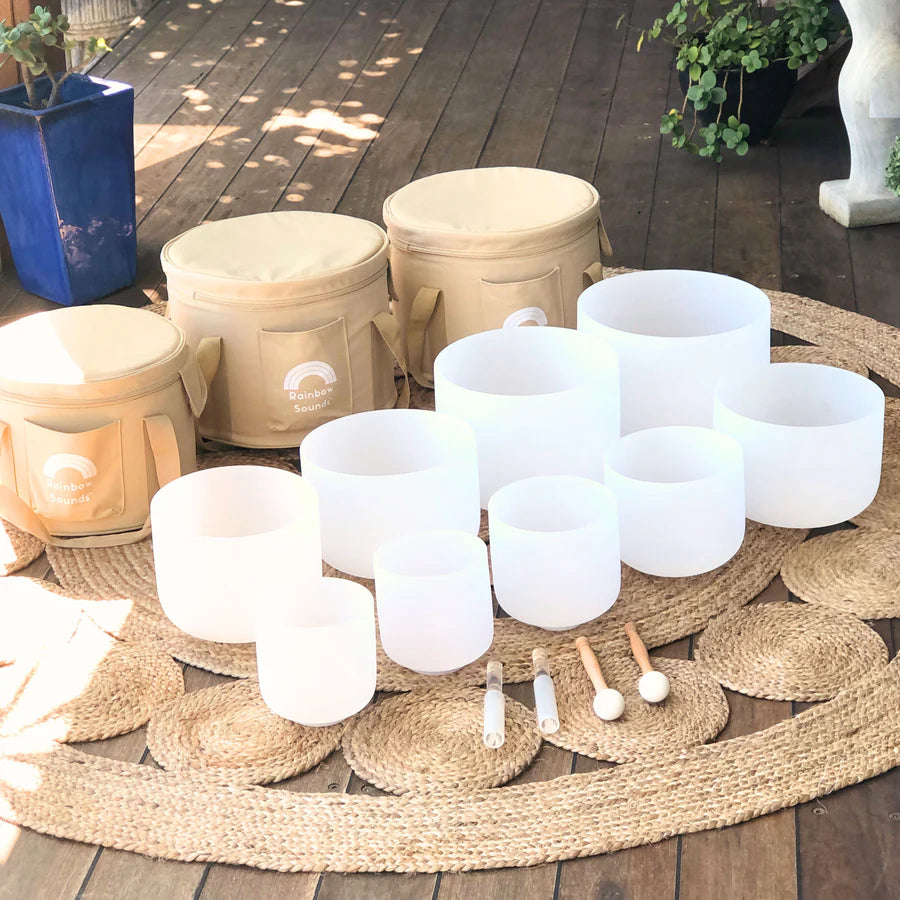 Set Of 9 White Crystal Singing Bowls in Beige Bags