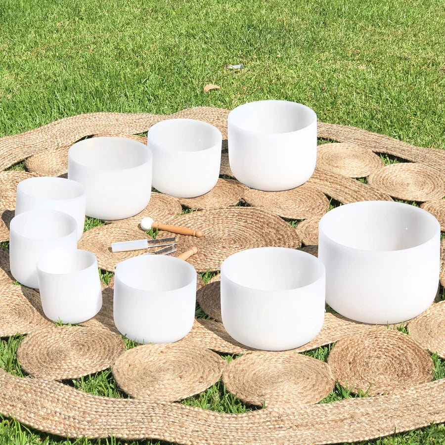 Set Of 9 White Crystal Singing Bowls in Beige Bags