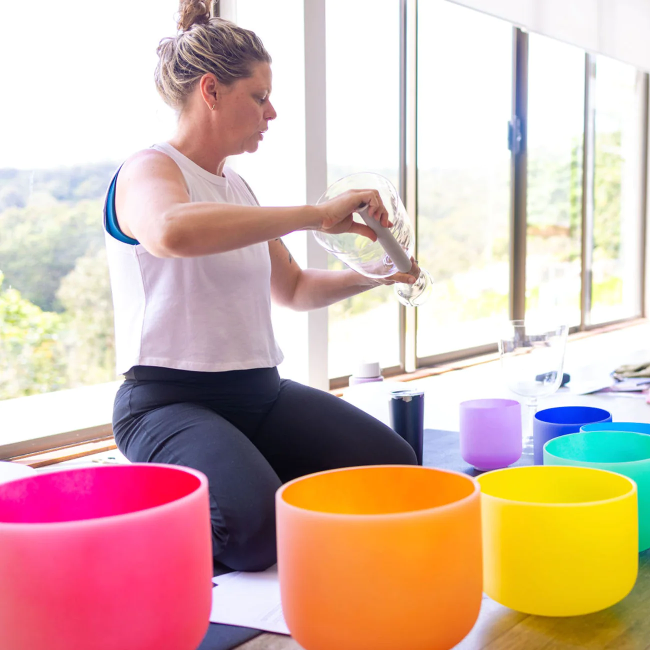 Sound healer using a Practitioner's Challis Crystal Singing Bowl